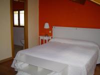 Postel nebo postele na pokoji v ubytování Hotel Balneario Almeida Dama Verde
