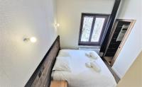 Postelja oz. postelje v sobi nastanitve White Pearl Vue Mont Blanc