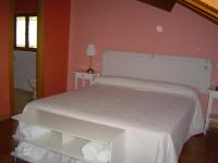 Postel nebo postele na pokoji v ubytování Hotel Balneario Almeida Dama Verde
