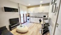 Kuchyň nebo kuchyňský kout v ubytování Cervantes Apartamentos