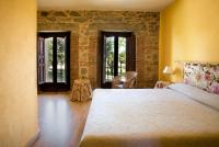 Postel nebo postele na pokoji v ubytování Hotel Balneario Almeida Dama Verde