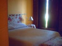 Postel nebo postele na pokoji v ubytování Hotel Balneario Almeida Dama Verde