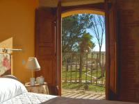 Postel nebo postele na pokoji v ubytování Hotel Balneario Almeida Dama Verde