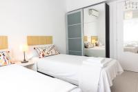 Posteľ alebo postele v izbe v ubytovaní Malaga Center Flat Holidays Salitre