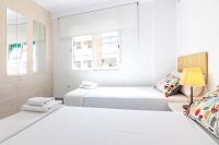Posteľ alebo postele v izbe v ubytovaní Malaga Center Flat Holidays Salitre