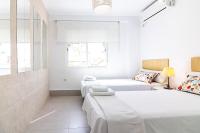 Posteľ alebo postele v izbe v ubytovaní Malaga Center Flat Holidays Salitre