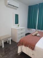Postel nebo postele na pokoji v ubytování APARTAMENTO MAYI