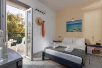 Posteľ alebo postele v izbe v ubytovaní Agrabella Hotel