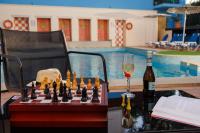 Nápoje v ubytovaní Agrabella Hotel