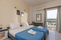 Posteľ alebo postele v izbe v ubytovaní Agrabella Hotel