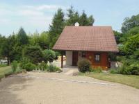 a small red house with a brown roof at Gîte Anould, 4 pièces, 6 personnes - FR-1-589-2 in Anould