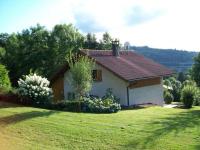 a small house in a field with a grass yard at Gîte Anould, 4 pièces, 6 personnes - FR-1-589-2 in Anould