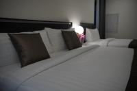 NORN Riverside Bangkok Hotel - นอนริมน้ำにあるベッド