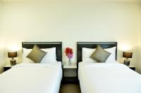 NORN Riverside Bangkok Hotel - นอนริมน้ำにあるベッド
