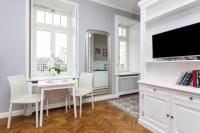Televízia a/alebo spoločenská miestnosť v ubytovaní Warsaw Concept