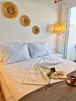 Postel nebo postele na pokoji v ubytování Galazio Rooms & Suites