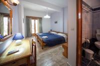 Posteľ alebo postele v izbe v ubytovaní Joanna Sea View Apartments