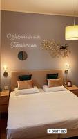 Posteľ alebo postele v izbe v ubytovaní Bigatt Bed & Breakfast