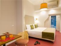 Posteľ alebo postele v izbe v ubytovaní Navona Colors Hotel