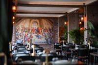 Un restaurante u otro lugar para comer en Assos Troy Port Hotel