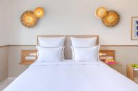 Posteľ alebo postele v izbe v ubytovaní Brown Beach Chalkida Kosher Resort, a member of Brown Hotels