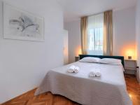 Posteľ alebo postele v izbe v ubytovaní Apartment Nika-7 by Interhome