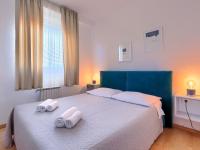 Posteľ alebo postele v izbe v ubytovaní Apartment Nika-7 by Interhome