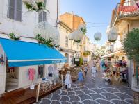 a group of people walking down a street at Apartment Le Grand Large-1 by Interhome in Sainte-Maxime