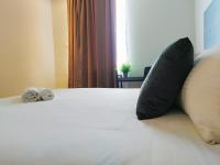Ένα ή περισσότερα κρεβάτια σε δωμάτιο στο The Leverage Business Hotel - Bandar Baru Mergong