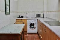 Kuchyňa alebo kuchynka v ubytovaní Apartamento cerca de la playa Torrecilla