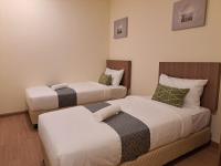 SCC HOTEL PJにあるベッド