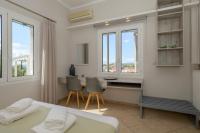 Posteľ alebo postele v izbe v ubytovaní Pelagia's Apartments Finikounda