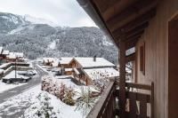a view from a balcony of a town with snow at Chalet Bio Corti 6p. 3 ch proche pistes&#47;commerces in Champagny-en-Vanoise