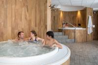 a group of people in a hot tub at Chalet Bio Corti 6p. 3 ch proche pistes&#47;commerces in Champagny-en-Vanoise