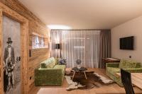 Televízia a/alebo spoločenská miestnosť v ubytovaní myLoisl Apartments
