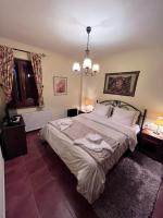 Posteľ alebo postele v izbe v ubytovaní Livadi cozy villa
