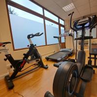 The fitness centre and/or fitness facilities at Hotel Ciudad Cangas de Onis