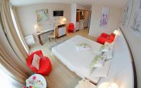 Televízia a/alebo spoločenská miestnosť v ubytovaní Apartment prywatny w Hotelu Diwa w strefie kurortowej z klimatyzacja i Parkingiem wcentrum Kolobrzegu