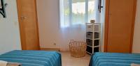 Postel nebo postele na pokoji v ubytování Las Golondrinas - TRAMUNTANA