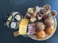 a plate of food with different types of food at Antwerp West Side in Zwijndrecht