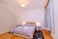 Posteľ alebo postele v izbe v ubytovaní Apartments Antonella