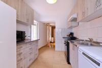 Kuchyňa alebo kuchynka v ubytovaní Apartments Antonella