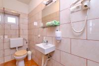 Kúpeľňa v ubytovaní Apartments Antonella