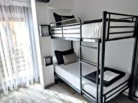 A bed or beds in a room at Getares Beach