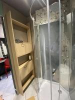 a shower with a glass enclosure in a room at LA MARIEFACTURE - Comme c&#39;est chic in Saint-Avold