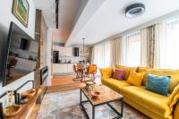 Televízia a/alebo spoločenská miestnosť v ubytovaní Apartament 3 Strążyska 21A