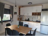 Kuchyň nebo kuchyňský kout v ubytování Apartmani Zlata