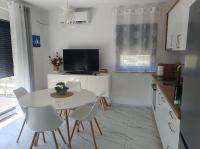 Kuchyň nebo kuchyňský kout v ubytování Apartmani Zlata