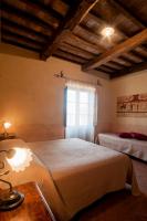 Posteľ alebo postele v izbe v ubytovaní Agriturismo Tenuta Roccaccia
