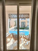Bazén v ubytování Mangroovy Gouna 1 BR apartment nebo v jeho okolí